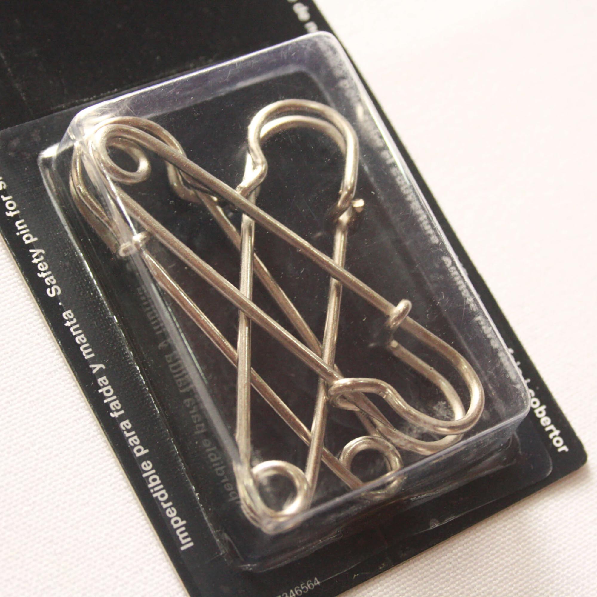 Alfinete para saia e cobertor